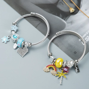 DIY charm bracelet with blue and colorful crystal heart pendants in stainless steel