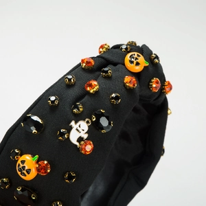 Serre-tête Halloween avec breloques fantôme citrouille et cristaux orange sur tissu noir
