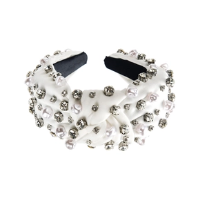 Elegant white satin padded headband with pearls and rhinestones featuring a top knot design