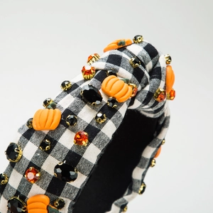 Cerchietto Halloween in tessuto vichy nero con zucche e strass lucidi di cristallo