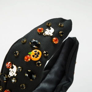 Serre-tête d'Halloween avec citrouille orange et fantômes blancs sur tissu noir