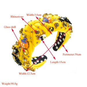 Detailed view of yellow Halloween headband with spooky charms and dimensions marked
