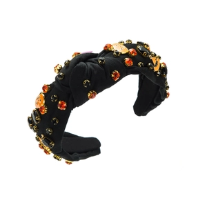 Halloween pumpkin headband with orange rhinestones and black ribbed fabric detail