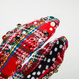 Plaid Christmas headband with white snowflake embroidery and sparkling pearl accents