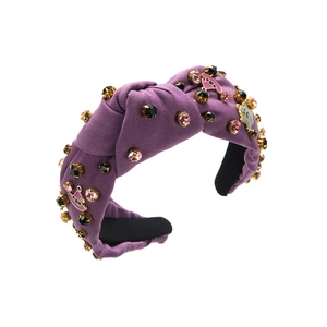 Detail of purple twisted headband with Halloween ghost charms and sparkling rhinestones