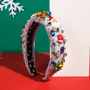 Christmas headband with Santa Claus figurines, bells and colorful gems on light blue base