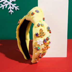 Detail of Christmas headband with gingerbread man, tree decorations and rhinestones