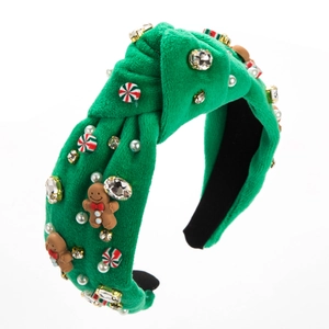 Cerchietto natalizio con omino di pan di zenzero, perle e strass su velluto verde
