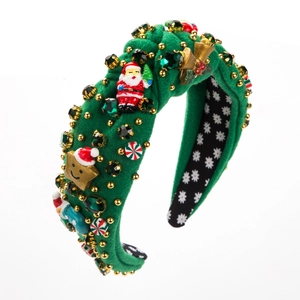 Christmas headband with Santa Claus and green rhinestones on fabric hair accessory