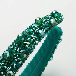 Elegant emerald green crystal padded headband with multifaceted glass beads for women