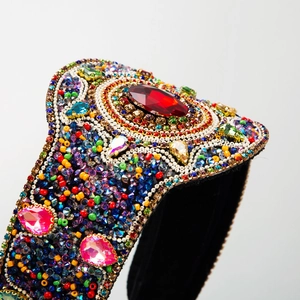 Luxury Baroque headband with colorful crystals, velvet base, and red teardrop gemstone