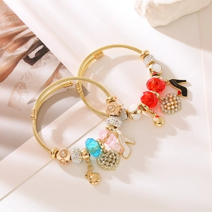 Adjustable gold twisted wire charm bracelets with high heel heart pendants and crystal beads