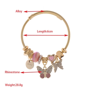 Adjustable golden alloy charm bracelet with rhinestone butterfly and pink heart pendants