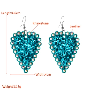 Sparkling turquoise heart earrings with rhinestones and leather backing for women