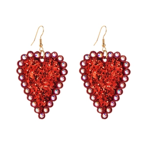 Sparkly red heart earrings with crystals and golden hooks against a white background