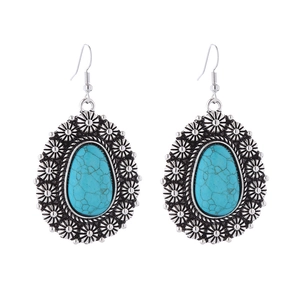 Boucles d'oreilles bohème vintage avec turquoise et monture florale argentée