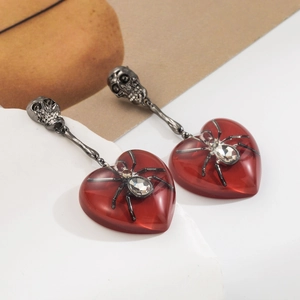 Gothic skull earrings with large red resin hearts and crystal spider charms for parties