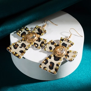Vintage leopard print cross earrings with gold accents and amber crystal center