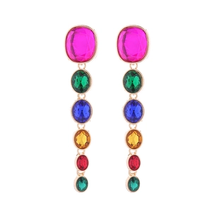 Exaggerated multi-colored crystal drop earrings with vintage gold frames and tiered glass gems