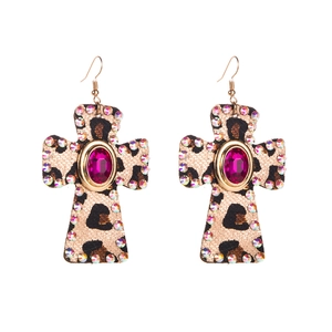 Vintage leopard leather cross earrings with rhinestone trim and magenta gemstone inlay