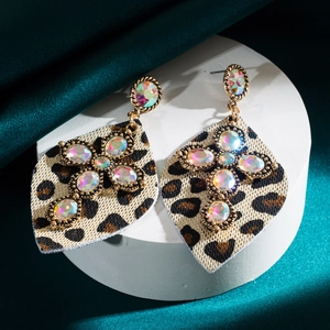 Boucles d'oreilles vintage léopard en cuir avec turquoise et motif croix strass