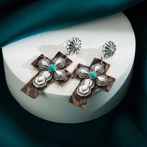 Vintage bohemian cross earrings with turquoise inlay and embossed brown leather texture