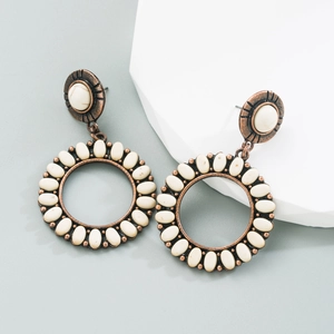Boucles d'oreilles rétro en alliage de bronze avec incrustation de turquoise blanche