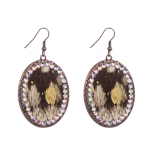 Vintage leopard print oval earrings with gold foil accents and rhinestone border