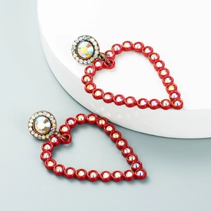 Exaggerated red heart drop earrings with alloy frames and colorful rhinestones