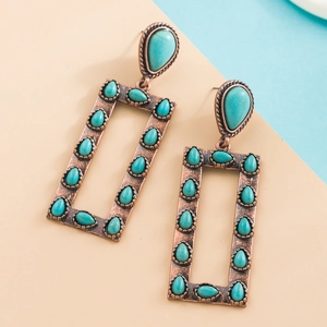 Vintage copper rectangle earrings with turquoise drop stones in a bohemian style