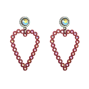 Exaggerated red heart drop earrings with rainbow rhinestones on a white background