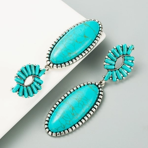 Vintage silver-plated drop earrings with oval turquoise stone and bohemian etched details