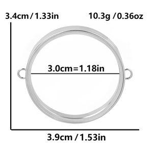 Schéma technique montrant 3,4 cm de diamètre et 10,3 g de poids pour le médaillon en acier