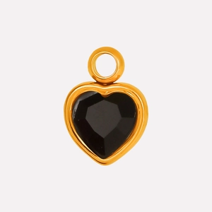 Detailed close-up of heart-shaped black stone pendant with elegant gold metal edging