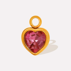 Macro shot of 304 stainless steel heart pendant with faceted pink glass crystal inlay