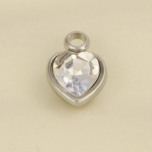 Macro shot of 304 stainless steel heart-shaped pendant with clear faceted crystal inlay