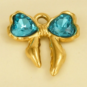 Detail of a golden bow pendant featuring two heart-shaped sea blue crystals with a top loop