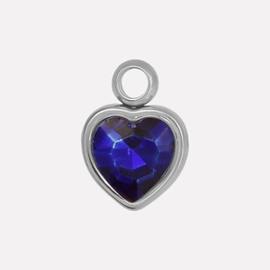 Detail of a 304 stainless steel heart pendant with faceted blue glass crystal