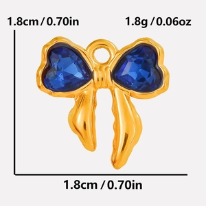 Detailed close-up of bow-shaped 304 stainless steel pendant with blue heart crystals