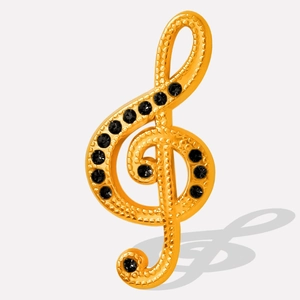 Pendentif clé de sol doré orné de strass noirs et de détails en métal grainé