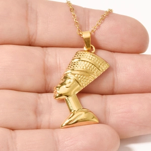 18k gold plated Nefertiti pendant necklace in 304 stainless steel displayed on a hand palm