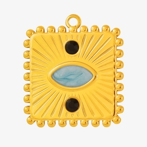Macro shot of rectangular gold stainless steel pendant with blue marble stone inlay