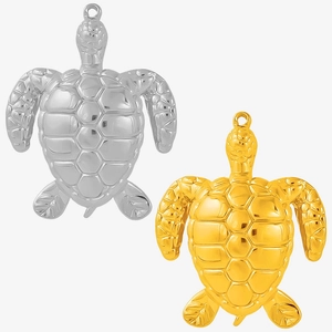 Detailed macro view of 304 stainless steel turtle pendants in polished gold and silver