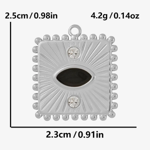 Detailed size view of vintage stainless steel pendant with black enamel and sunburst pattern