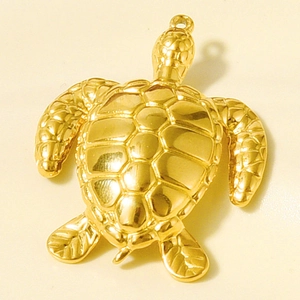 Detailed top view of gold-plated stainless steel sea turtle pendant with shell texture