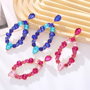 Colorful geometric crystal drop earrings in blue and pink with gold plating