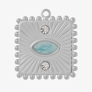 Detail of square vintage pendant with blue enamel and crystal accents in silver