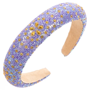 Detail of a purple Baroque padded headband with luxury crystals and gold amber rhinestones