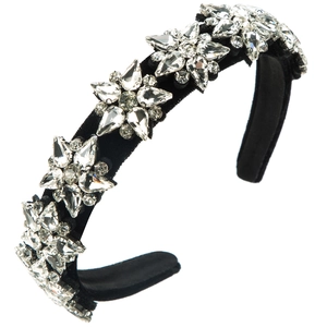 Detail of wide black velvet headband featuring sparkling 3D crystal star embellishments