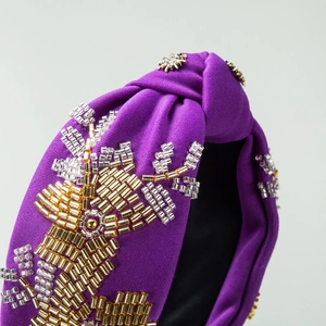 Handmade purple beaded headband with floral patterns and gold star studs for women